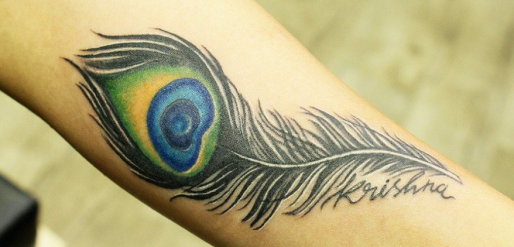 Colorful Feather Tattoo Inked By Black Poison Tattoos
