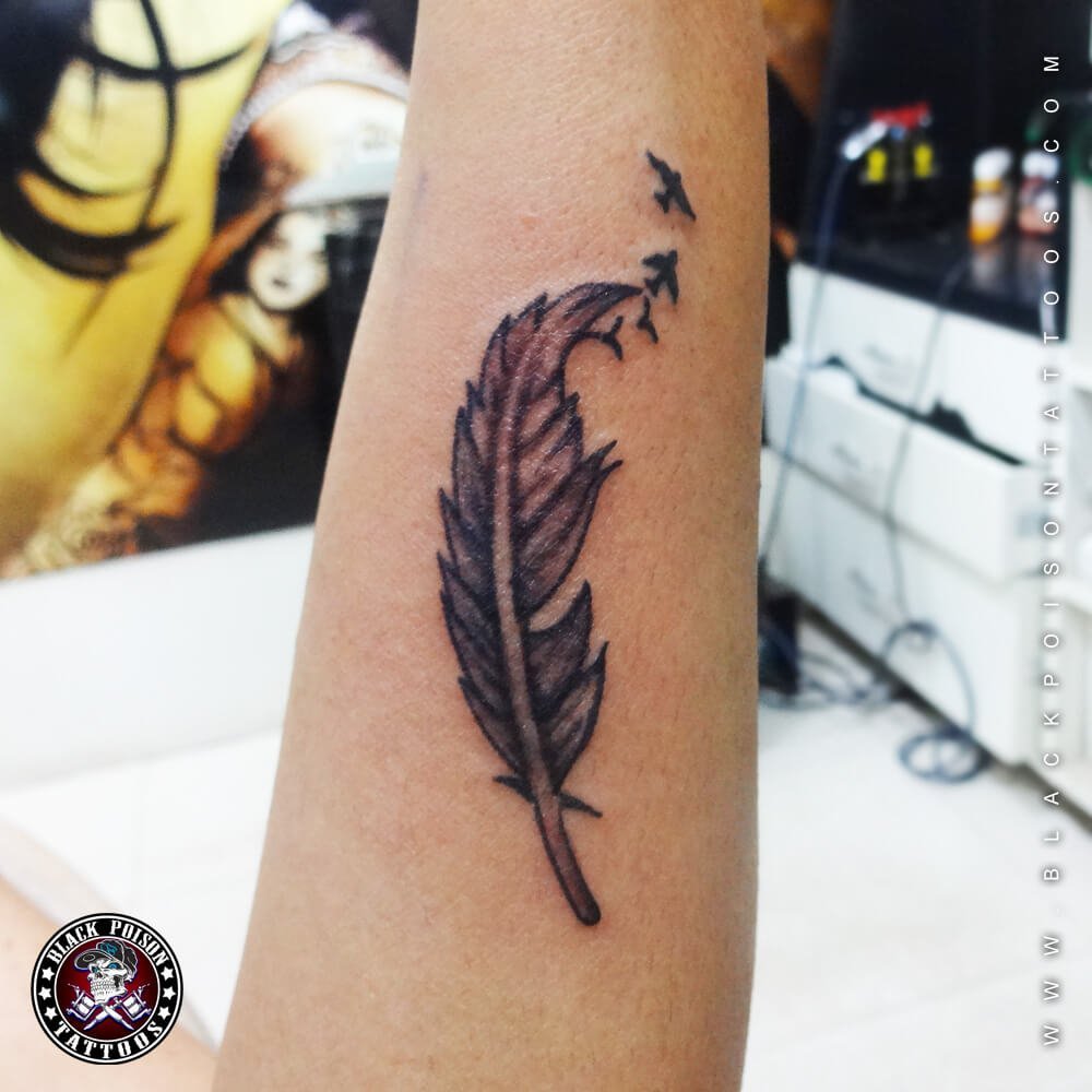Feather tattoos, designs of feather tattoos, feather tattoo ideas, feather tattoo images, feather tattoo meanings, famous feather tattoos